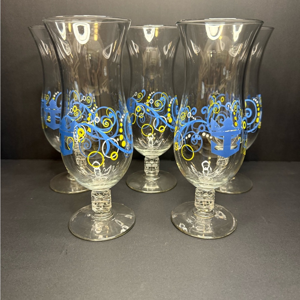 Set of 5 Blue and Yellow hurricane cocktail glasses from royal Caribbean cruise.